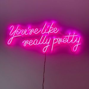“You’re like really pretty” neon sign